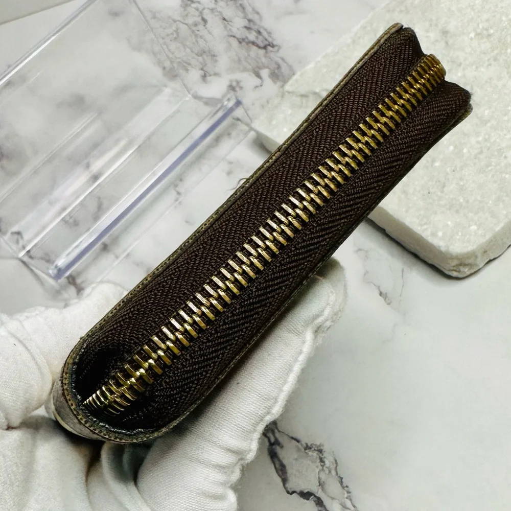 EUC Louis Vuitton Monogram Groom Zippy Organizer Wallet Alpine Green